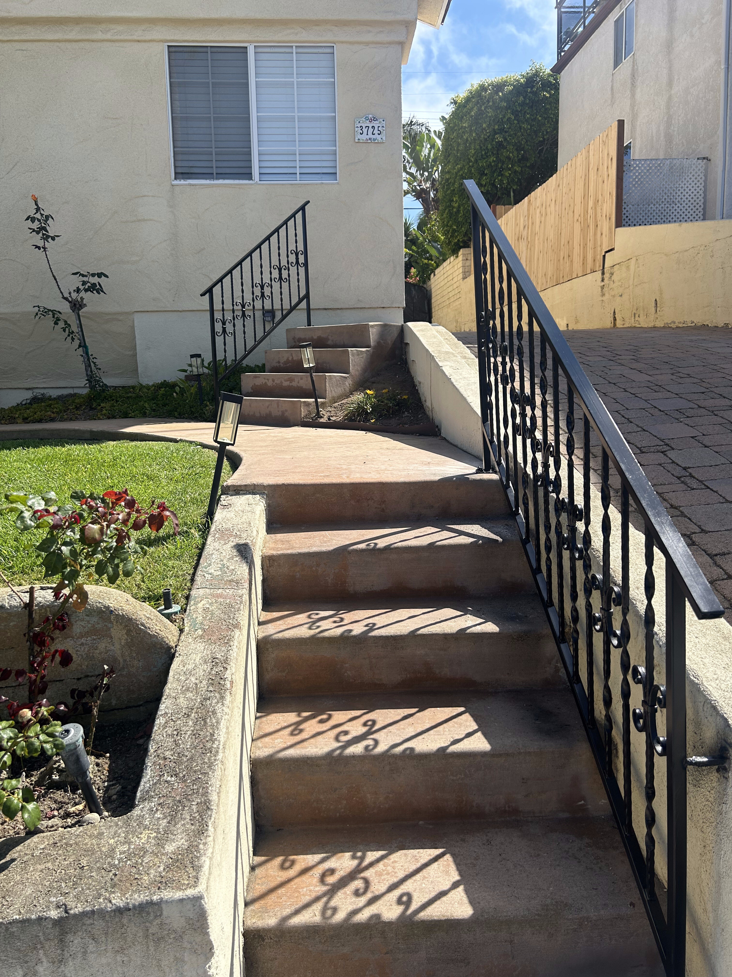 Wrought iron stair railing installation